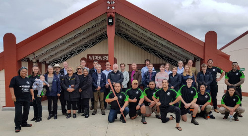 An image of a group shot outside a marae.