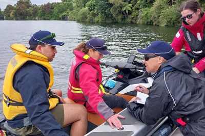 Harbourmaster in discussions with the skipper of a jetski on Lake Karapiro