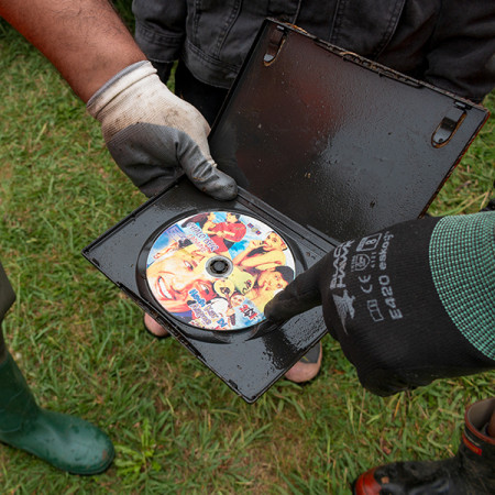 Image of someone holding a DVD