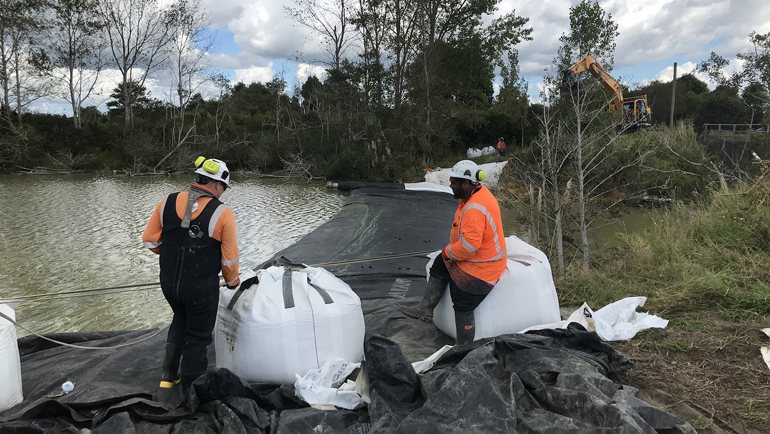 The lake was dammed using an Aquadam, which is basically a heavy-duty plastic pipe filled with water - the weight of the water keeps it on the lakebed.