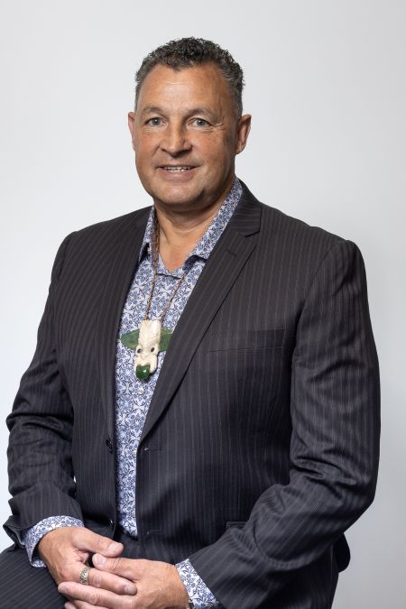 Photo of Mich'eal Downard sitting on chair